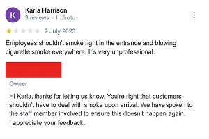 Example of a business replying to a 1-star Google review about unprofessional staff smoking